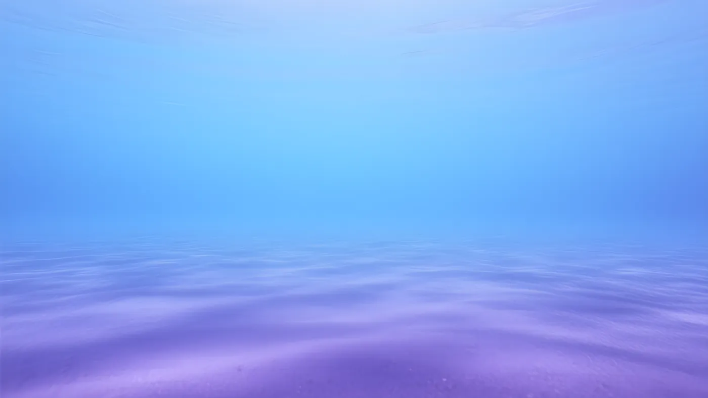 Fondo marino en calma, azul y violeta, con el agua limpia y abierta